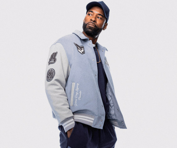 2021 Pro Football Hall of Fame Inductee Calvin Johnson Jr posing in 2026 Jeeter Game Day Limited Drop Apparel Capsule Line